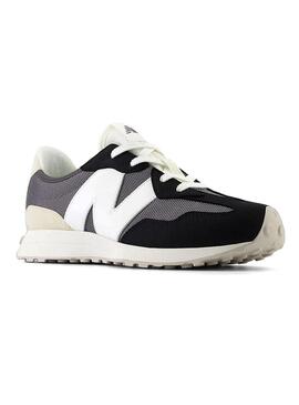 Scarpe New Balance 327 nere per bambina e bambino.