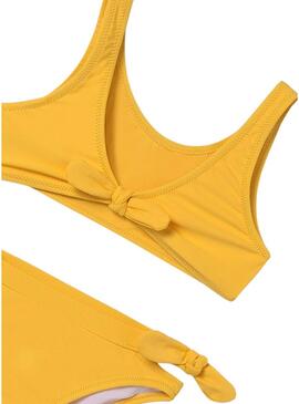 Bikini Mayoral con fiocco giallo per bambina.