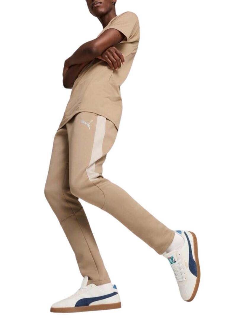 Pantaloni Puma Evostripe beige per uomo.