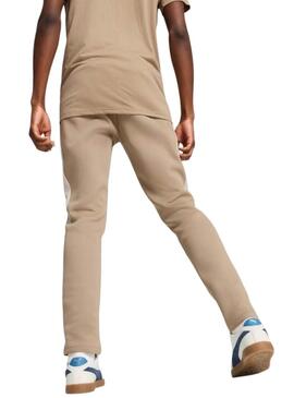 Pantaloni Puma Evostripe beige per uomo.