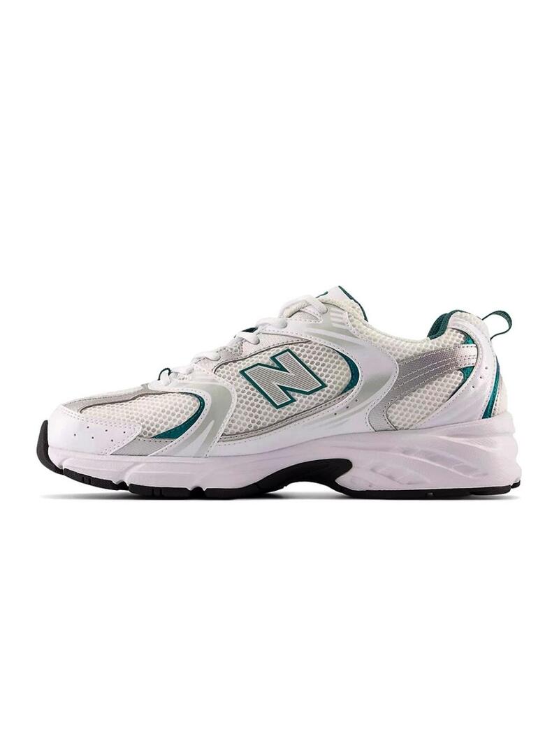 Sneakers New Balance 530 bianche con verde e argento per donna.