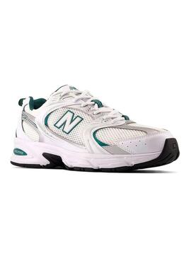 Sneakers New Balance 530 bianche con verde e argento per donna.