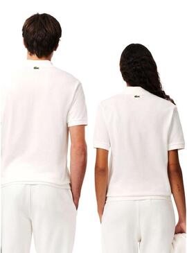 Polo Lacoste L.12.12 logo stampato bianco per uomo e donna