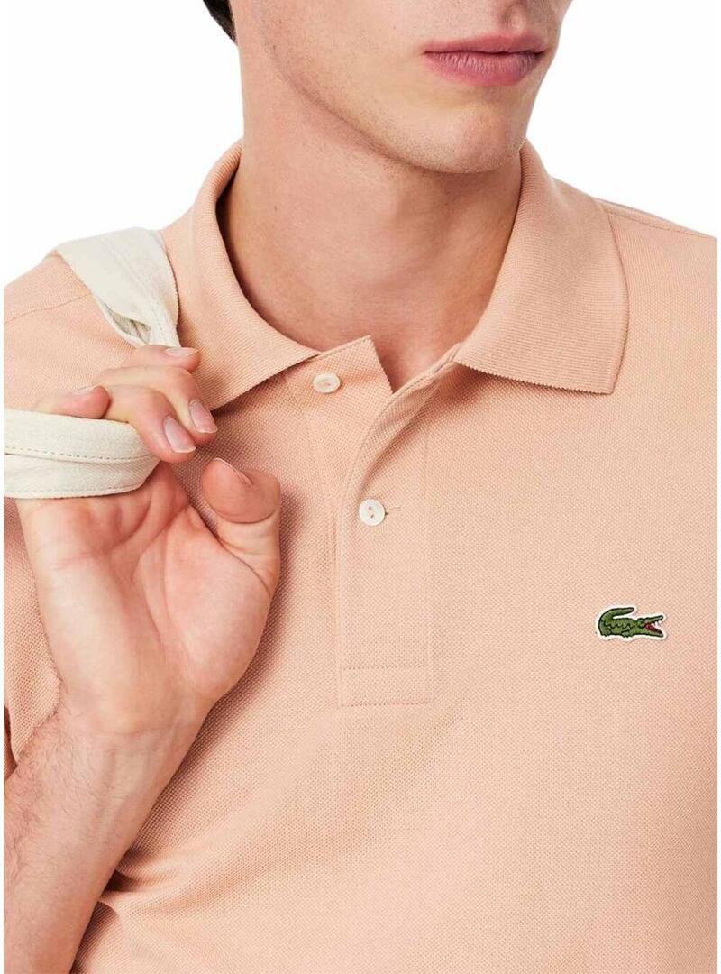 Polo Lacoste Piqué L.12.12 corallo per uomo.